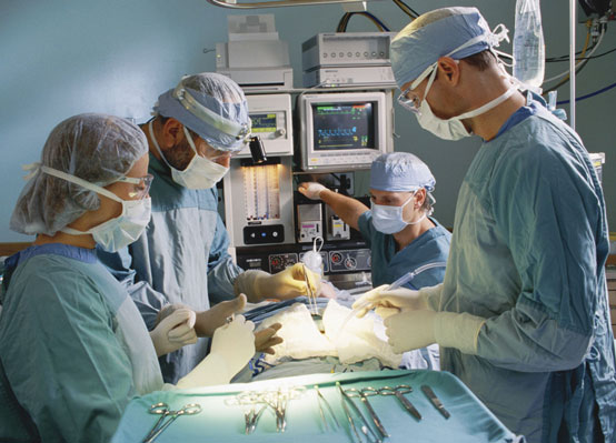 Doctors performing surgery