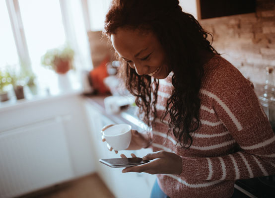 Woman looking at phone.