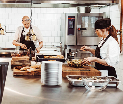 chefs working at a kitchen